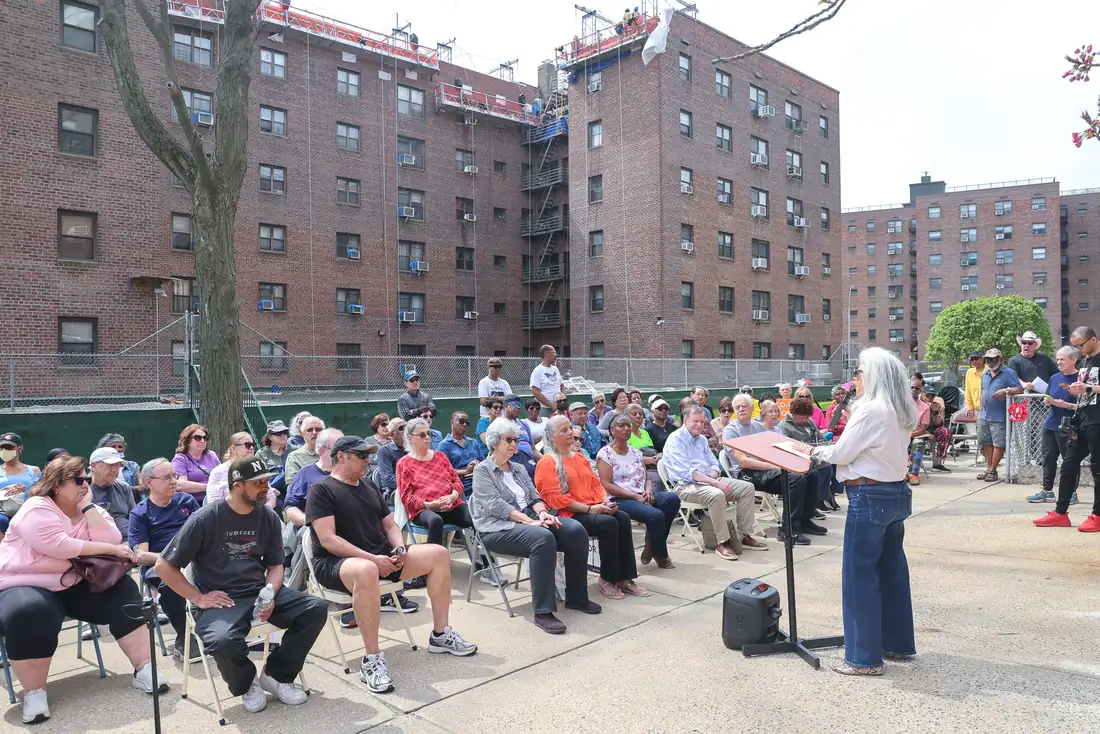 Shareholders seated at a Co-ops and Condos United rally